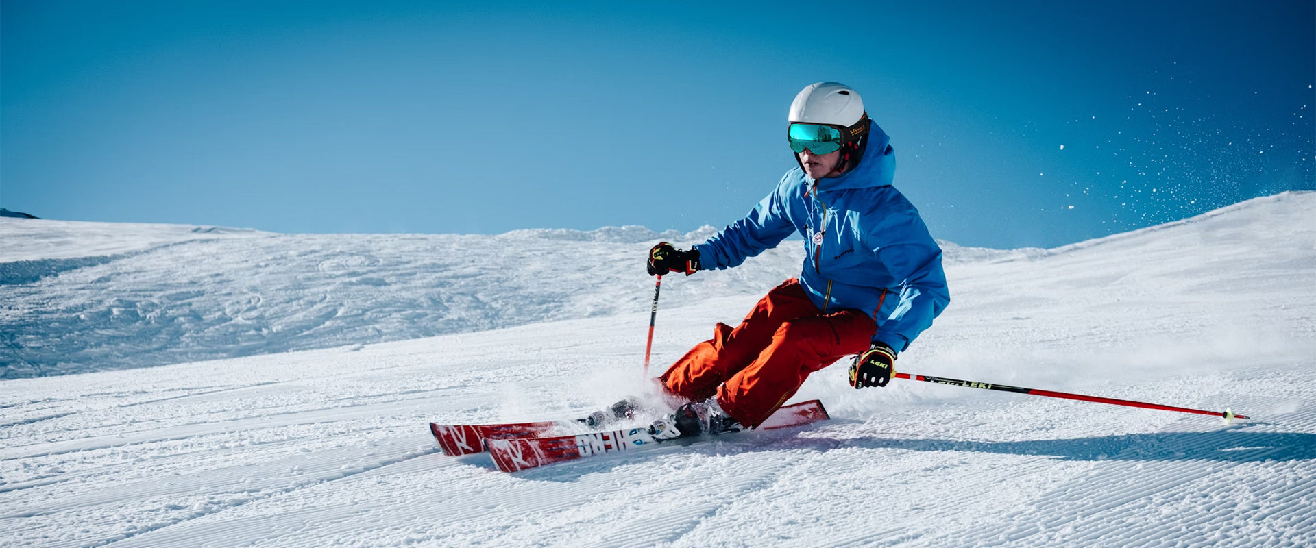 a men is skiing with snow goggles in winter