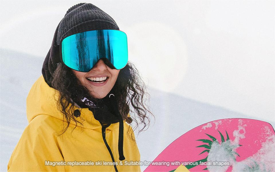 a women wears  snow goggles in winter